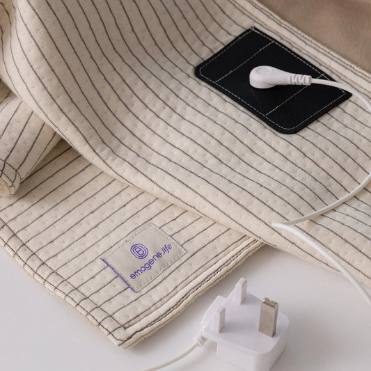 Emagene Life striped fabric pad with USB connector, UK plug, and brand label on white surface