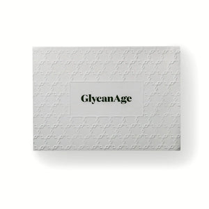 GlycanAge test kit box with white embossed geometric pattern, functional medicine branding