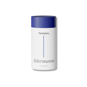 White container with blue lid labeled 'Pendulum Akkermansia' on a white background